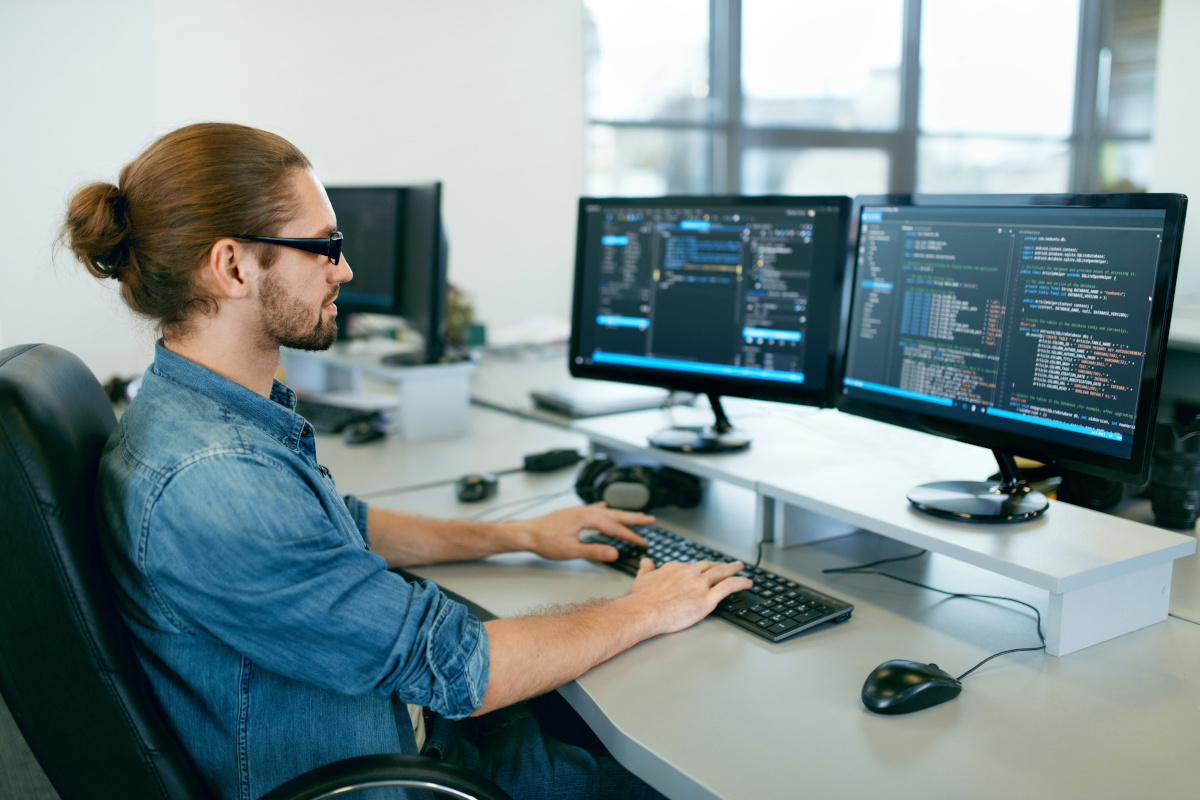 Man working with code