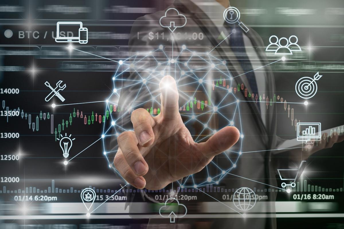 Man working on digital network security diagram