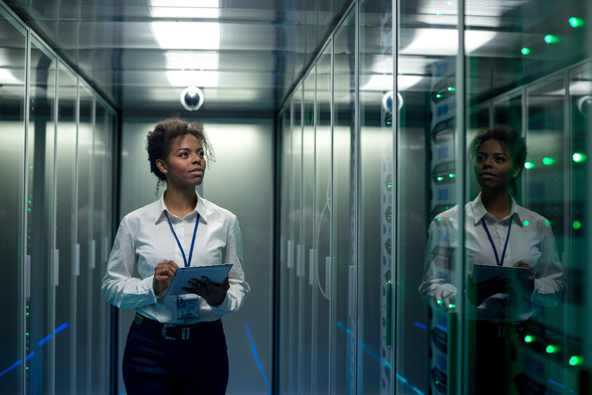 Woman looking at network hardware installation
