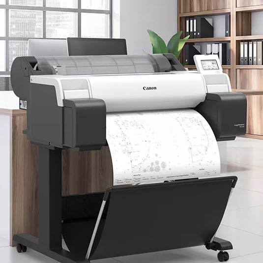Wide format printer and flower shop with flyers and posters on the wall