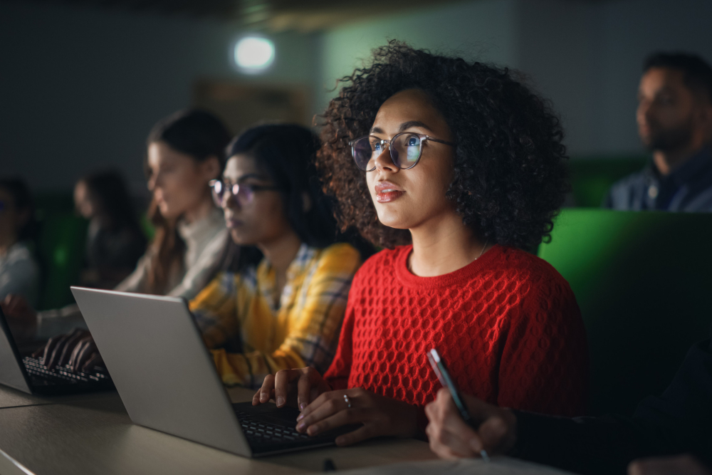 Students Learning in University with Laptops