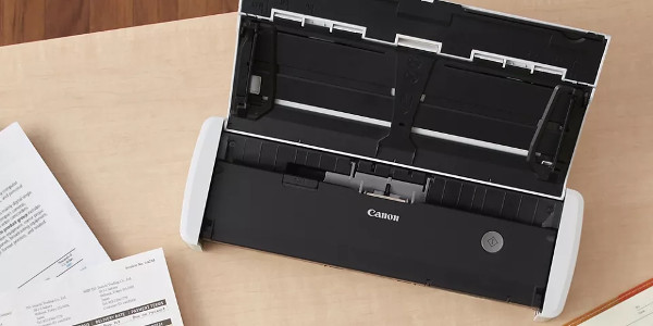 Mobile scanner sitting on a wooden table