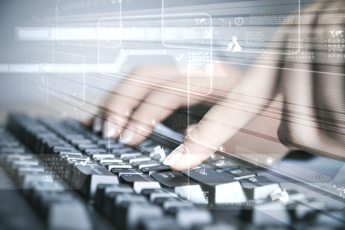 Compound image of woman's hands on keyboard with digital graphics