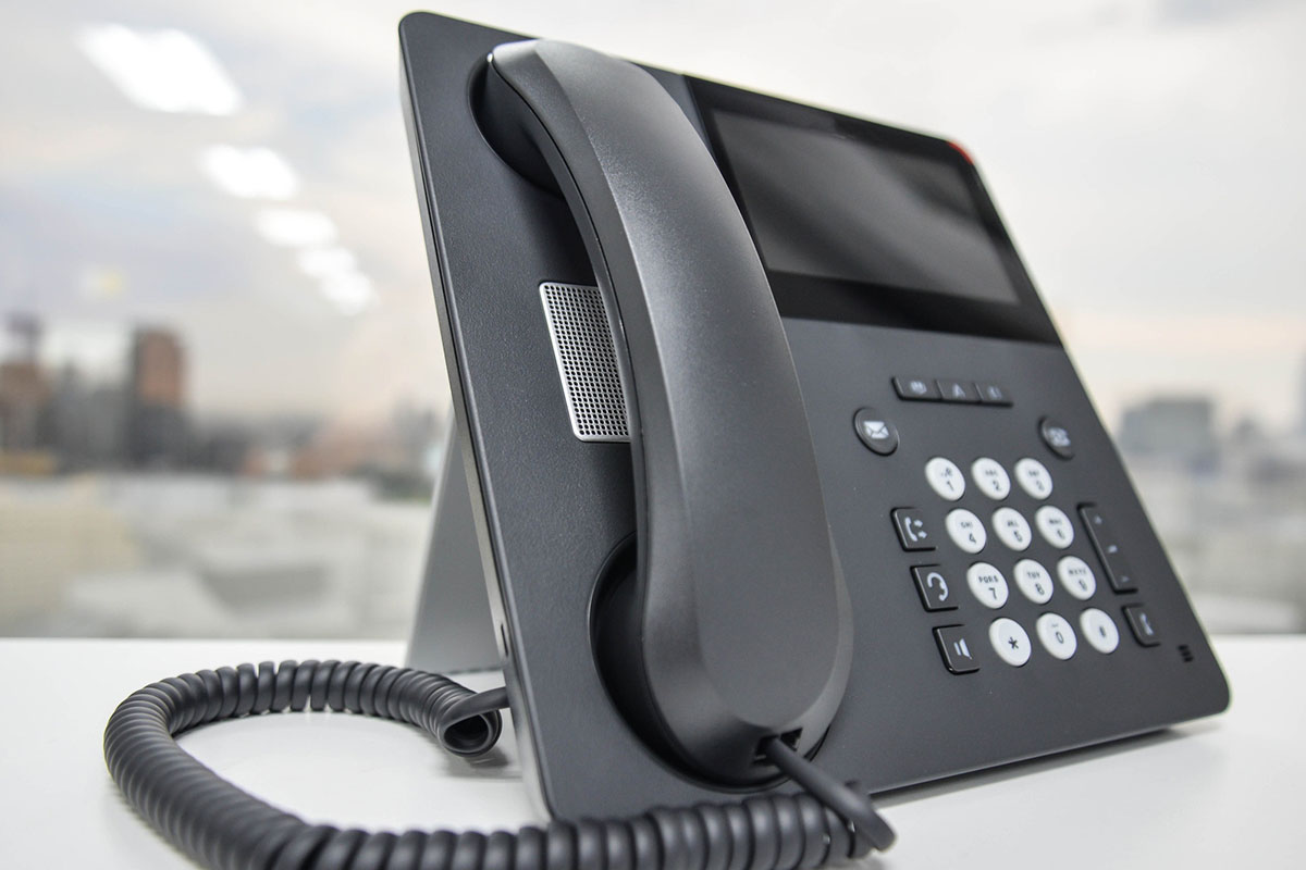 VoIP phone sitting on a desk